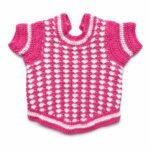 Back view showing the pink and white crochet texture