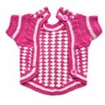 Open sweater showing two buttons and sleeve openings